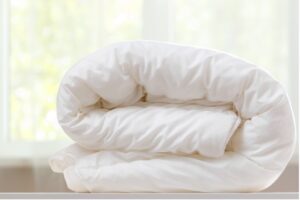 Cómo desinfectar las sábanas y edredones en casa
